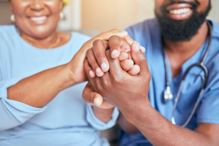 nurse holding hands patient support kind care with